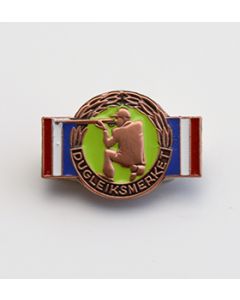 Dugleiksmerket bronse emaljert